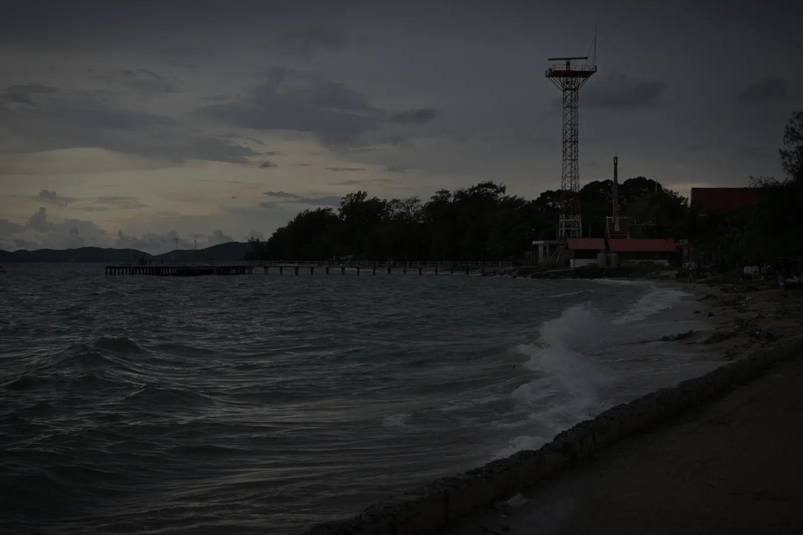 Ditch Plains shoreline at dusk, the old tower on the point